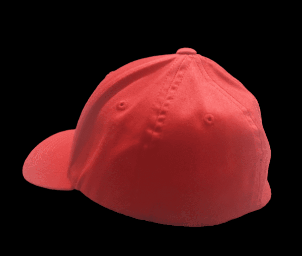 A red hat is on the ground