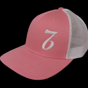 A pink and white hat with the number seven on it.