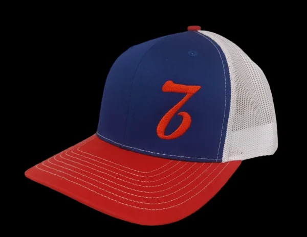 A red, white and blue hat with the number seven on it.