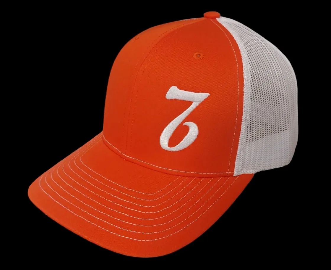 A red and white hat with the number seven on it.