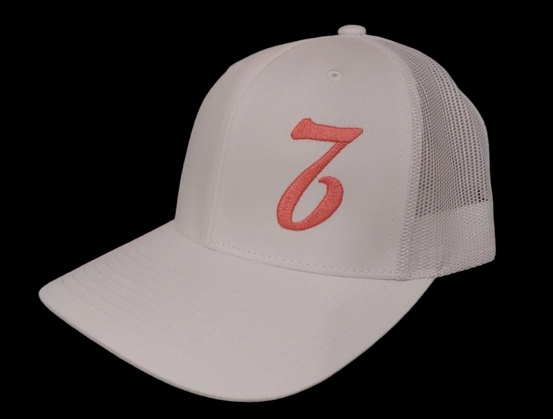 A white hat with the number seven on it.