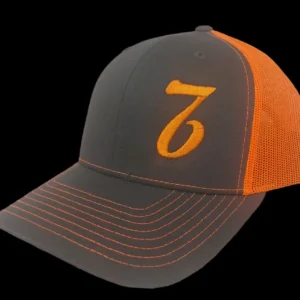 A gray and orange hat with the number seven on it.