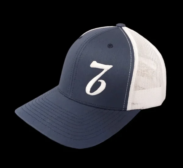 A blue and white hat with the number seven on it.