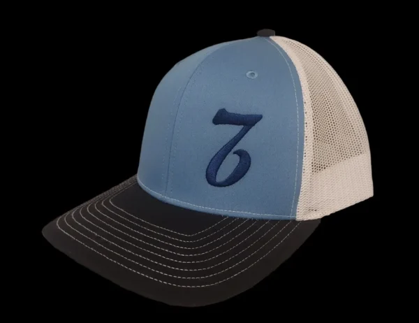 A blue and white hat with the number seven on it.